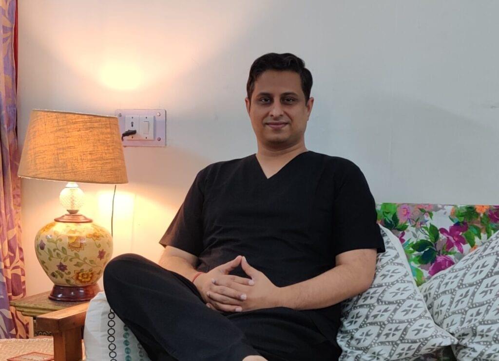 "Best urologist in Lucknow sitting in a clinic office"